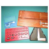 Machinist square, micrometer and mo...