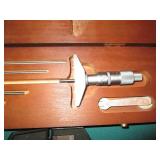 Machinist square, micrometer and mo...