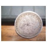 1879 Morgan One dollar coin...