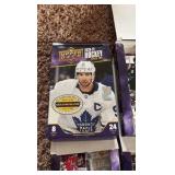 Four Opened Boxes of 2020-21 Upper Deck Hockey Card Boxes, Looks Like the Young Guns Rookies Have Been Taken Out But the Star Cards are Mostly There Along With Commons, Includes A Few Hundred Cards