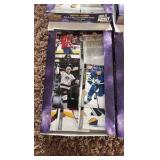 Four Opened Boxes of 2020-21 Upper Deck Hockey Card Boxes, Looks Like the Young Guns Rookies Have Been Taken Out But the Star Cards are Mostly There Along With Commons, Includes A Few Hundred Cards