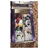 Four Opened Boxes of 2020-21 Upper Deck Hockey Card Boxes, Looks Like the Young Guns Rookies Have Been Taken Out But the Star Cards are Mostly There Along With Commons, Includes A Few Hundred Cards