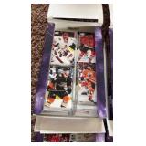 Four Opened Boxes of 2020-21 Upper Deck Hockey Card Boxes, Looks Like the Young Guns Rookies Have Been Taken Out But the Star Cards are Mostly There Along With Commons, Includes A Few Hundred Cards