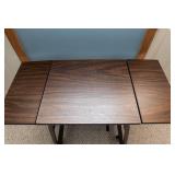 Rolling Table with Fold-Down Leaves – Compact Utility Table