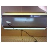 This vintage sign features branding for Conn organs, a prominent manufacturer of electronic organs