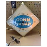 vintage Conn Organ illuminated wall clock in working condition