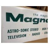 Vintage lighted advertising sign for Magnavox electronics.