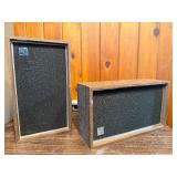 Vintage speakers, similar in style to the RSL (Roger Sound Lab) bookshelf speakers commonly found from the 1970s and 1980s