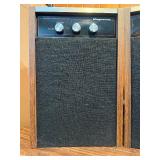 Both power on- Pair of This is a vintage Magnavox remote receiver speaker. It features control knobs for loudness, treble, and bass.