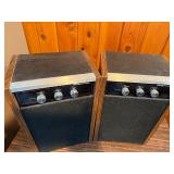 Both power on- Pair of This is a vintage Magnavox remote receiver speaker. It features control knobs for loudness, treble, and bass.