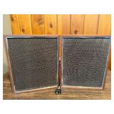 Vintage loudspeakers, likely Jensen 3-P 1 slim shelf models based on their distinctive wooden frames and mesh grill pattern  LIKELY