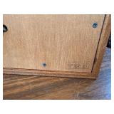 Vintage loudspeakers, likely Jensen 3-P 1 slim shelf models based on their distinctive wooden frames and mesh grill pattern  LIKELY