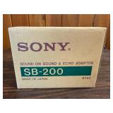 The image shows the original box for a Sony SB-200 Sound-On-Sound & Echo Adaptor. This vintage 1970s