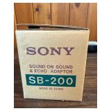 The image shows the original box for a Sony SB-200 Sound-On-Sound & Echo Adaptor. This vintage 1970s
