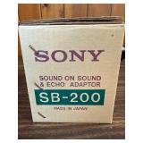 The image shows the original box for a Sony SB-200 Sound-On-Sound & Echo Adaptor. This vintage 1970s