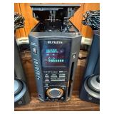 Vintage Aiwa XR-MS3 micro stereo system, including the main unit, remote control, and speakers
