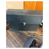 This item is a Sharper Image Portable DVD/Sound Soother (Model SI655)