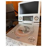 This item is a Sharper Image Portable DVD/Sound Soother (Model SI655)