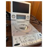 This item is a Sharper Image Portable DVD/Sound Soother (Model SI655)
