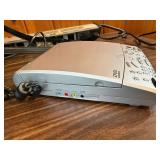 This item is a Sharper Image Portable DVD/Sound Soother (Model SI655)