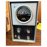 This device is a Conn Strobotuner ST-11, a highly accurate vintage strobe tuning device from the 1970s: New