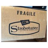 This device is a Conn Strobotuner ST-11, a highly accurate vintage strobe tuning device from the 1970s: New