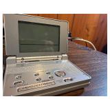 Sharper Image Design Travel Alarm plus RCA Disc player and ear phones.