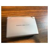 Sharper Image Design Travel Alarm plus RCA Disc player and ear phones.