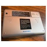 Sharper Image Design Travel Alarm plus RCA Disc player and ear phones.