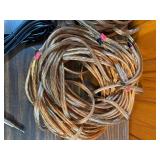 various lengths of clear-jacketed speaker wire