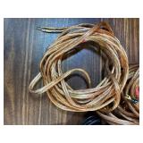 various lengths of clear-jacketed speaker wire