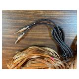 various lengths of clear-jacketed speaker wire
