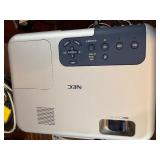 Near perfect condition NEC VT660, a portable 3LCD multimedia projector powers on , illuminates