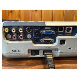 Near perfect condition NEC VT660, a portable 3LCD multimedia projector powers on , illuminates