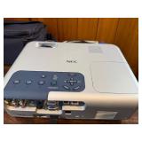 Near perfect condition NEC VT660, a portable 3LCD multimedia projector powers on , illuminates
