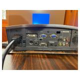 Powers on , illuminates -Mitsubishi HC1100 DLP Projector, designed for home theater use.