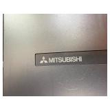 Powers on , illuminates -Mitsubishi HC1100 DLP Projector, designed for home theater use.