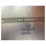 Powers on , illuminates -Mitsubishi HC1100 DLP Projector, designed for home theater use.