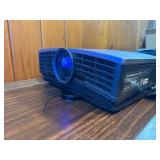 Powers on , illuminates -Mitsubishi HC1100 DLP Projector, designed for home theater use.