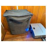 Powers on , illuminates -Mitsubishi HC1100 DLP Projector, designed for home theater use.