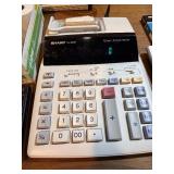 Lot of SHARP Calculator’s - most are operational , reel works on the main unit.