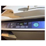 Sharp AL-2040CS desktop digital copier/printer powers on makes copies.