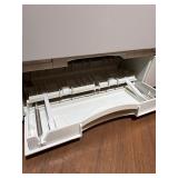 Sharp AL-2040CS desktop digital copier/printer powers on makes copies.