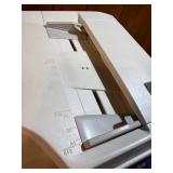 Sharp AL-2040CS desktop digital copier/printer powers on makes copies.