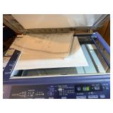 Sharp AL-2040CS desktop digital copier/printer powers on makes copies.