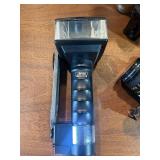 classic Canon AE-1 35mm film photography kit with several compatible accessories