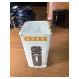 classic Canon AE-1 35mm film photography kit with several compatible accessories