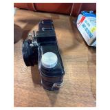 This vintage collectible is a Herold Acro-Flash bakelite miniature camera, manufactured by the Herold Manufacturing Company in Chicago, Illinois