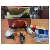 This vintage collectible is a Herold Acro-Flash bakelite miniature camera, manufactured by the Herold Manufacturing Company in Chicago, Illinois