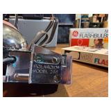 vintage Polaroid Automatic 215 Land Camera Pulse bulbs and Polaroid model 268 Flash and Case